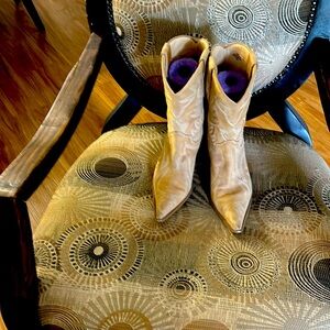 I have some beige cowboy boots with designs on them leather upper